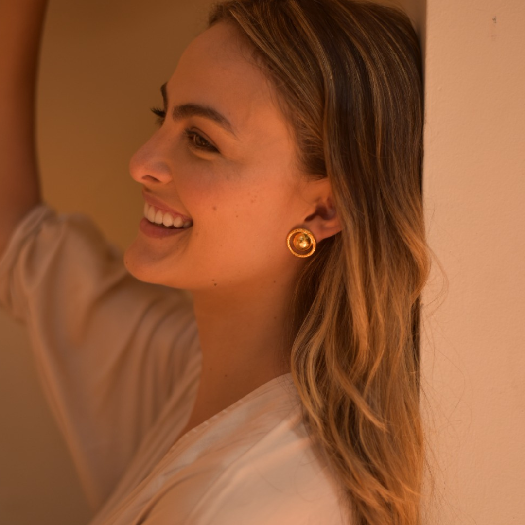 Handcrafted Menguante Earrings in bronze with a 24-karat gold plating.