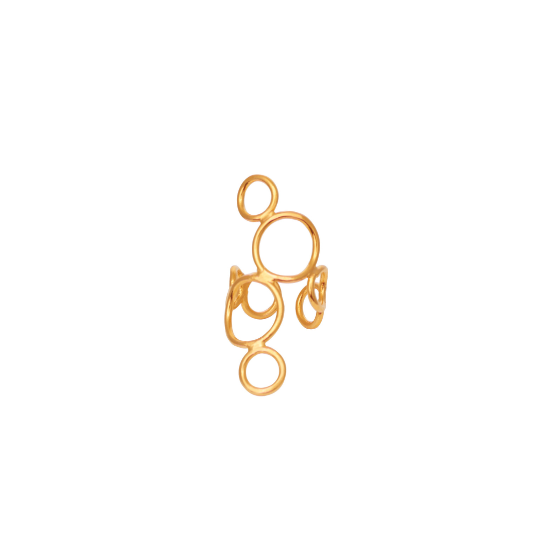 The Atomo Ring handmade by Colombian artisans in bronze with 24-karat gold plating