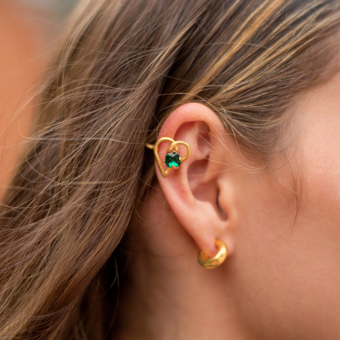 The Melo ear cuff are handmade by Colombian artisans in bronze with 24-karat gold plating