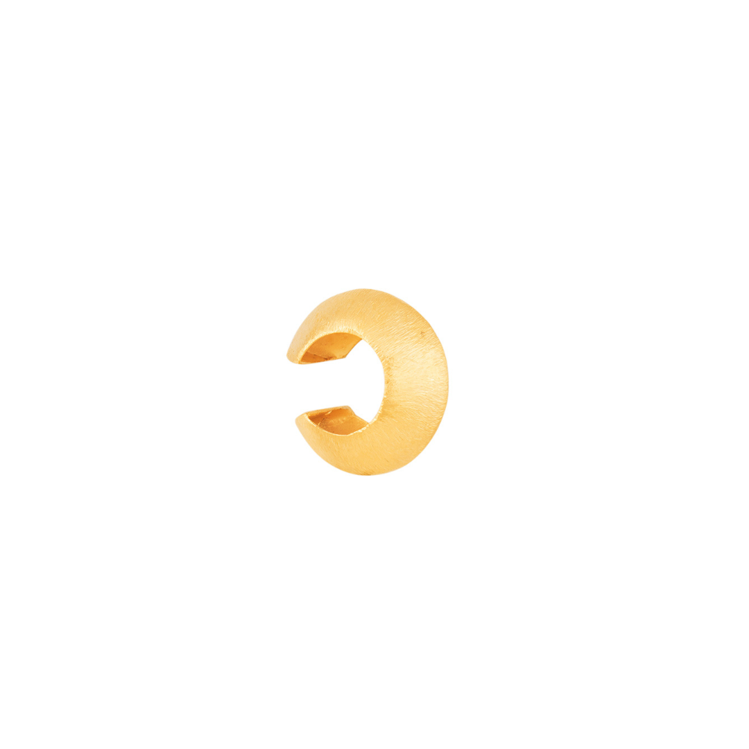 The Pima ear cuff are handmade by Colombian artisans in bronze with 24-karat gold plating