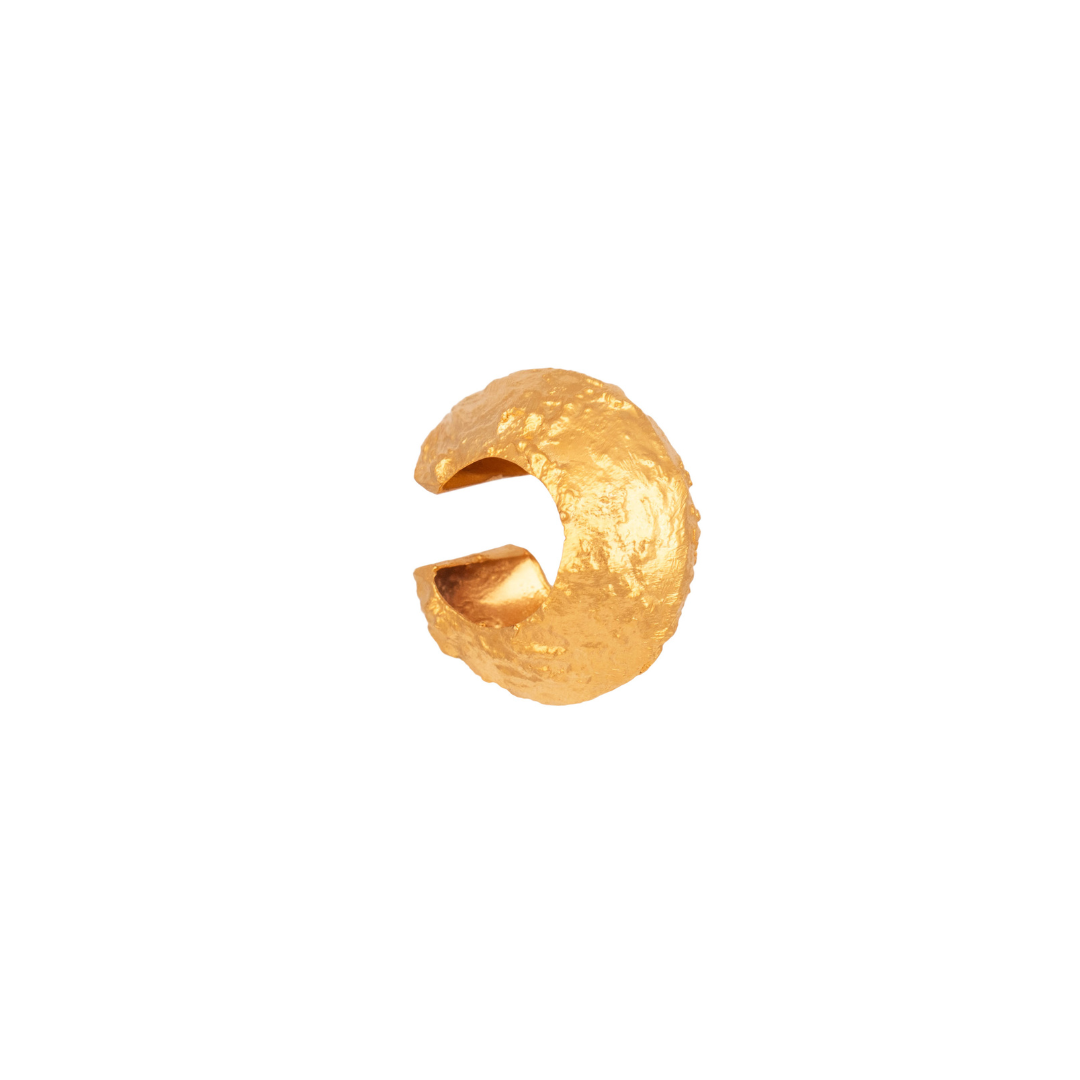 The Piro ear cuff are handmade by Colombian artisans in bronze with 24-karat gold plating