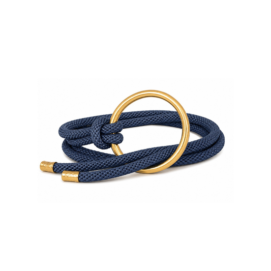 The Aro is a belt handcrafted by Colombian artisans with bronze, textile cord, and 24-karat gold plating