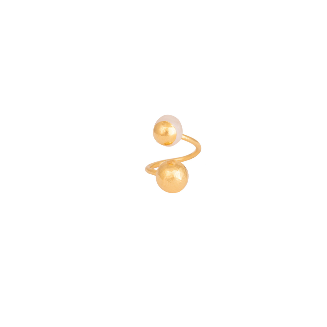 The Bambi ring  is handmade by Colombian artisans in bronze with 24-karat gold plating and cultured pearl