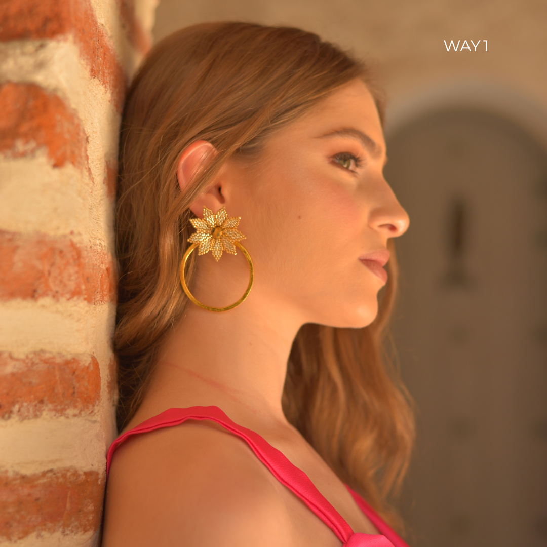 The Flora earrings are versatile earrings that can be worn in 2 different ways. Our jewelry is handmade by Colombian artisans in bronze with 24-karat gold plating.